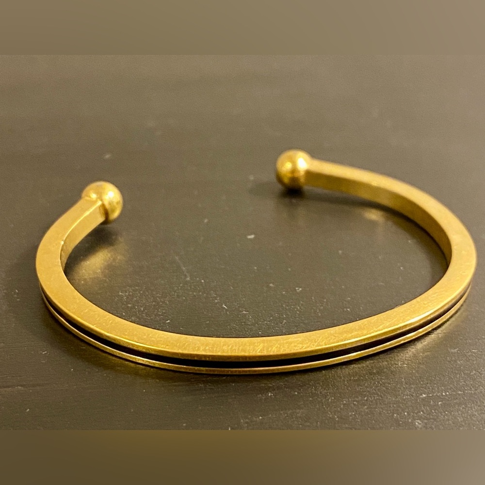 Avon Vintage Gold Tone Metal Cuff Bracelet with Black Stripe